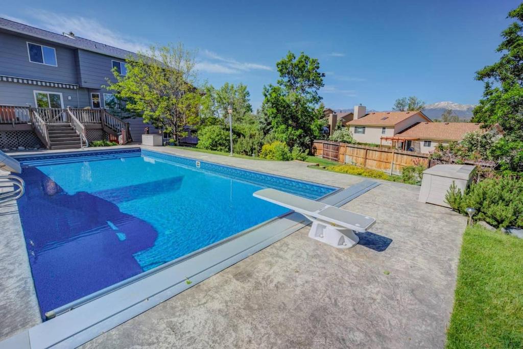 Briargate House | 6BR with Pool & Water Slide, Hot Tub, Peak View
