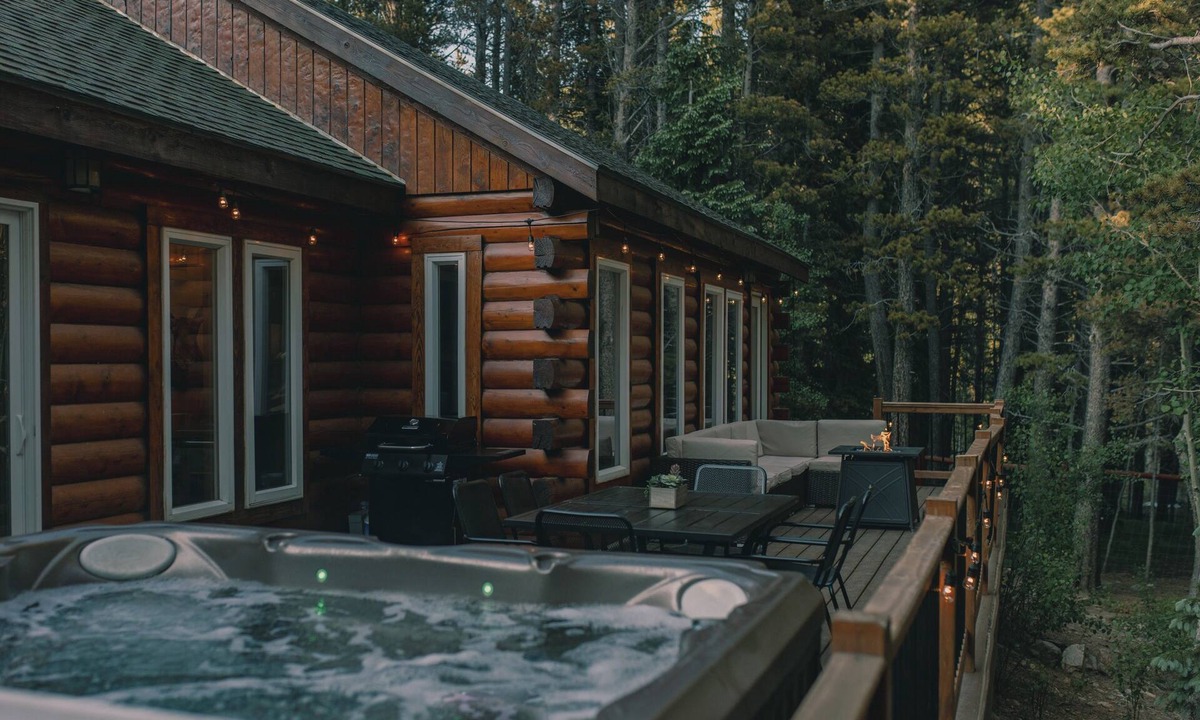 Saint Mary's Cabin | Cozy Log Cabin: hot tub under the stars, private deck, king bed, dog friendly!