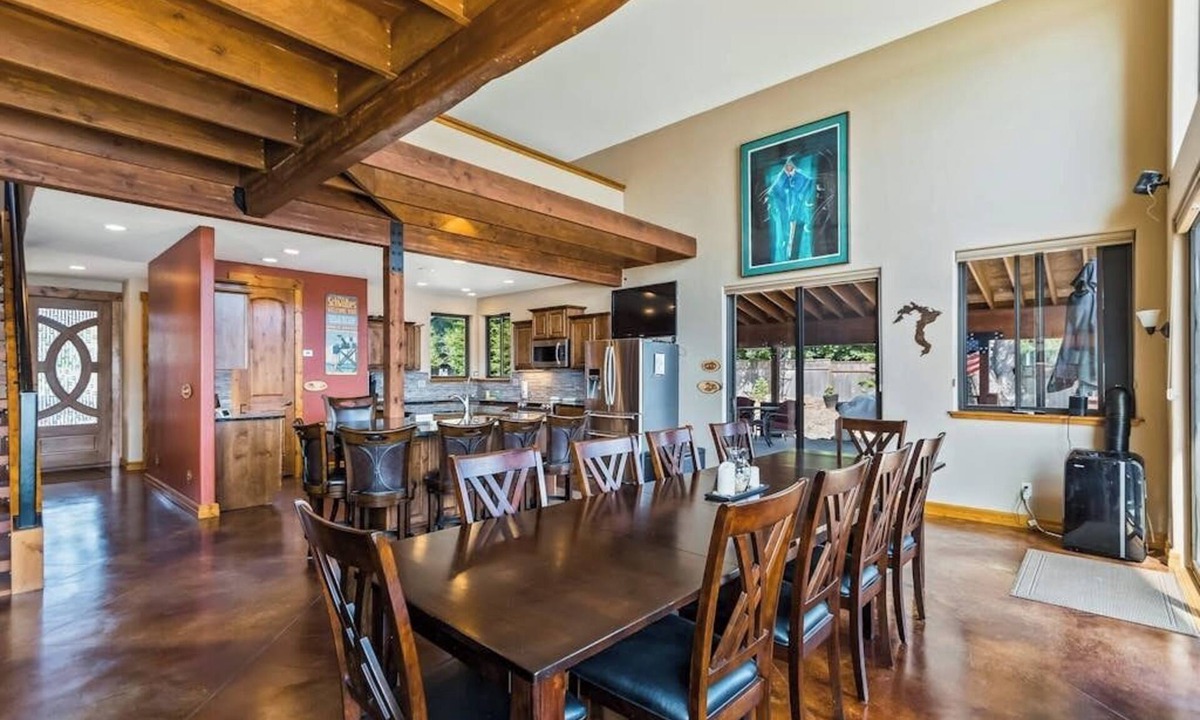 Laclede House | Custom riverfront home with private dock, game room, hot tub & heated floors