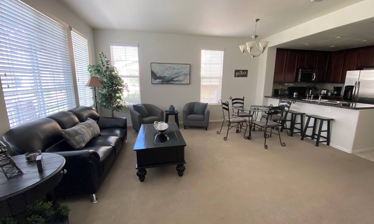 Aurora House | End-unit townhome with garage, patio, and office, near shopping and trails!