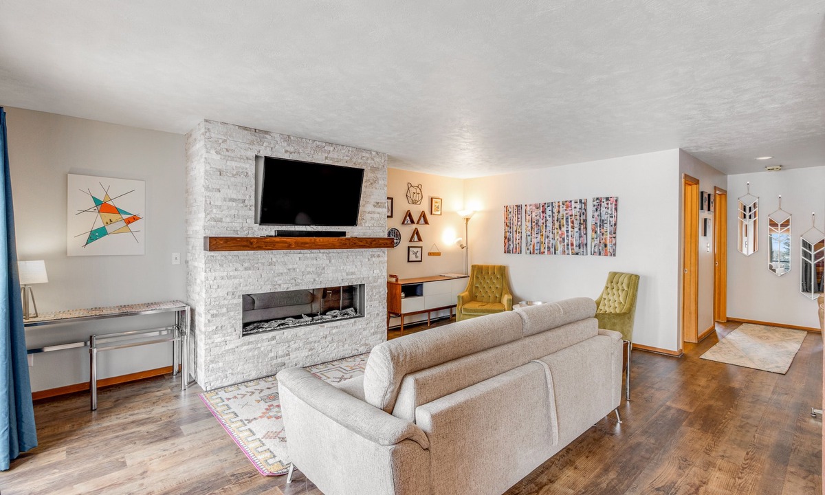 Wildernest Condo | First-floor condo with porch & electric fireplace - close to ski resorts