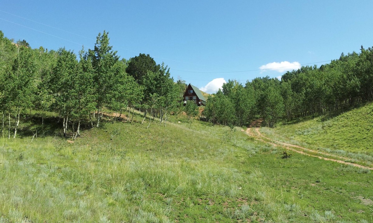 Cripple Creek House | Imagine a romantic couple’s cabin nestled in the heart of the Colorado Rockies