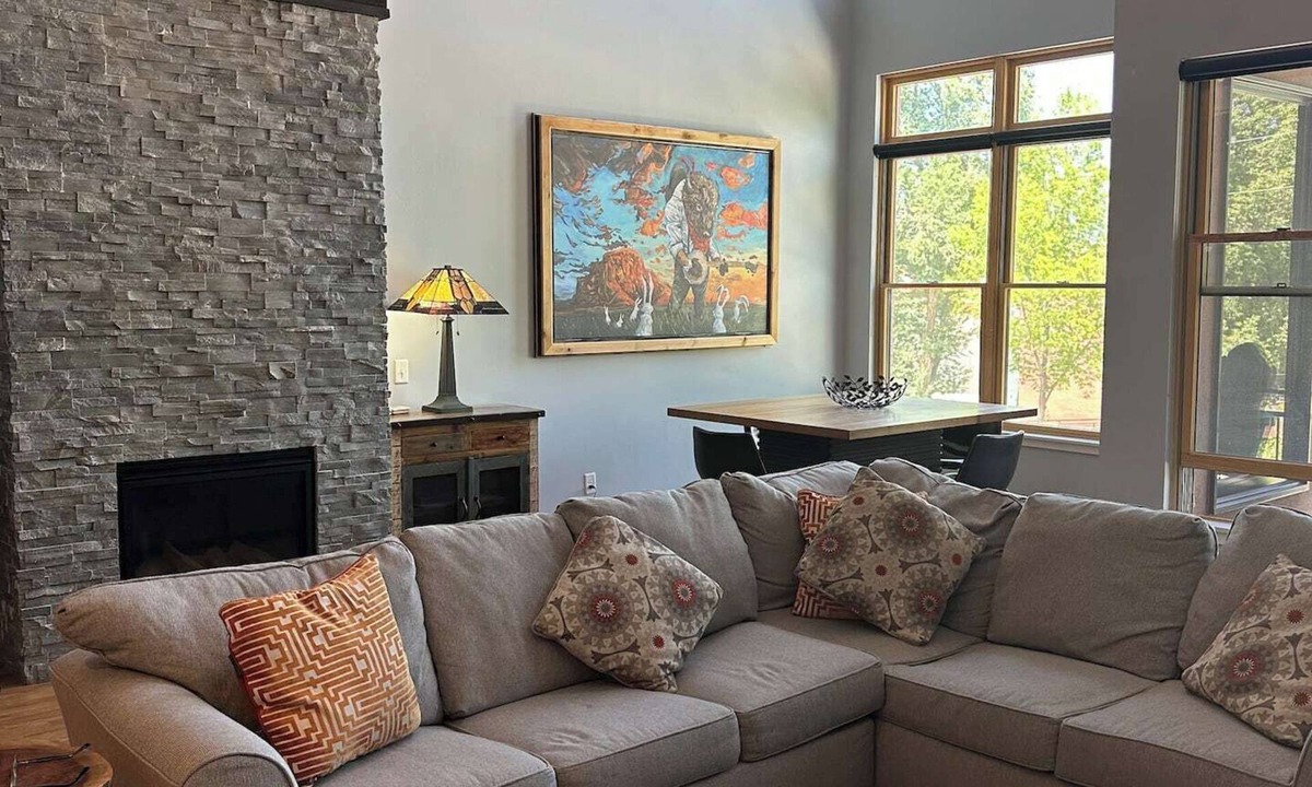 Salida Condo | Lofted condo on the boat ramp, downtown Salida, king bed plus super comfortable queen murphy bed and sleeper sofa. Two levels, two bathrooms, parking spot in garage included.
