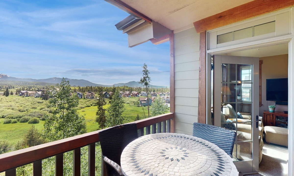 Fraser House | Mountain-view condo on ski shuttle route with deck & fireplace