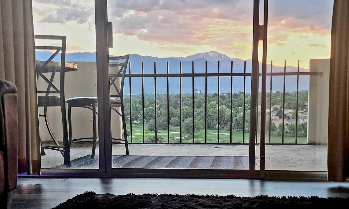 Southeast Colorado Springs Condo | Mountain Views! 2 bdrm, full home, 10th floor- 48ft balcony Pike's Peak sunsets!