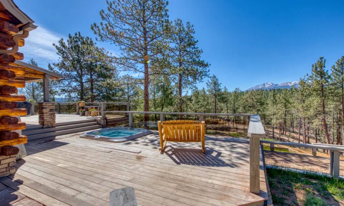 Woodland Park Cabin | Spacious cabin in the woods w/a private hot tub, deck, & fireplace SUV needed