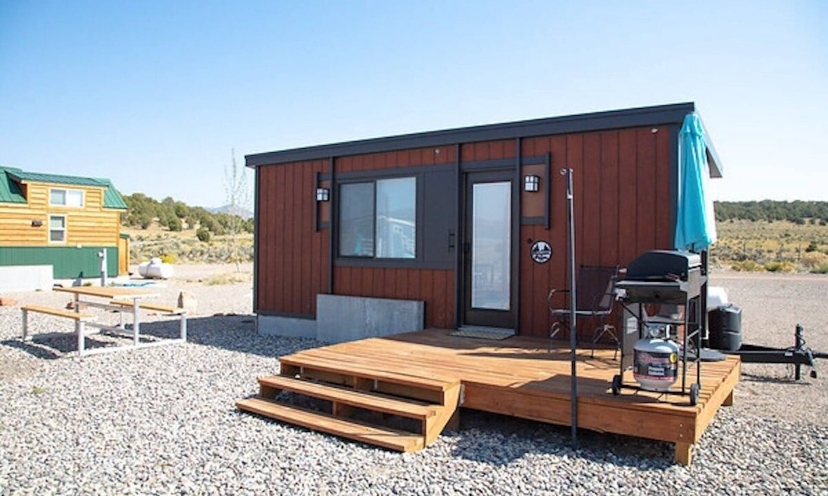 Meeker House | Tiny home with one queen bed and fold out couch all on main floor. Sleeps: 3