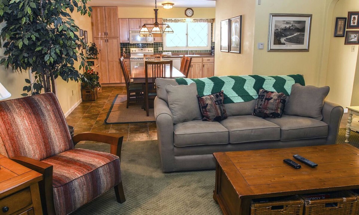 Estes Park Condo | Two Bedroom Condo with Fantastic View of Fall River from the Spacious Deck.