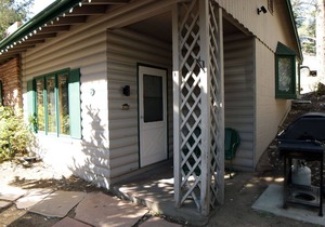 1 bedroom, 1 bath attached cabin, kitchen, wood burning fireplace