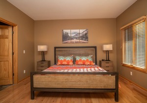 Cozy up in this spacious condo with two fireplaces, large deck, and hot tub!