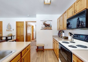 Creekside condo w/patio, fireplace & open layout perfect for a group getaway