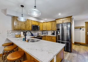 Creekside townhome on bus route with lovely views, fireplace, W/D - dog-friendly