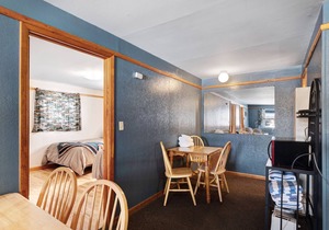 Dog-friendly lodge cabin near dining & shopping w/ shared grill & mountain views