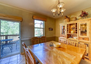 Elegant & spacious home with fireplaces, deck & garage access