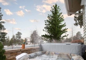 Enchanting condo with fireplace, patio, and private hot tub!