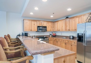 Family-Friendly 2-Bedroom Condo Tucked in the Woods