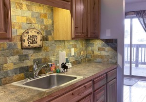 Ground-Floor, All-Seasons Condo with Shaded Deck, Fireplace & Shared Hot Tubs