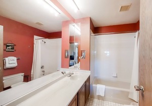 Inviting condo with outdoor heated pool, private hot tub, fireplace & W/D access