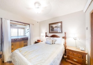 Inviting condo with outdoor heated pool, private hot tub, fireplace & W/D access