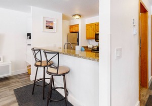 Mountain-view condo with fireplace, pool & hot tub access - close to sledding