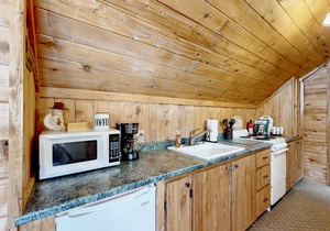 Mountain-view studio with private balcony, wood stove, and fast WiFi