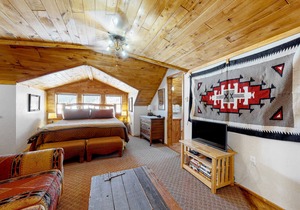 Mountain-view studio with private balcony, wood stove, and fast WiFi