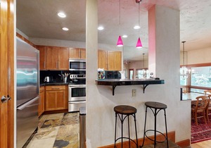 Renovated Creekside Condo w/Wood Stove & Shared Hot Tub/Pool - Steps to Shuttle