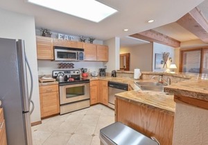 Rustic 5th-Floor Condo with Private Balcony & Wood Fireplace by RedAwning