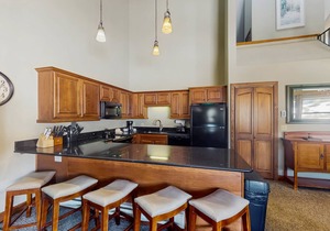 Ski-in/out condo with pool, hot tub - steps to Snowflake Lift