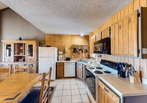 Ski-in/ski-out condo with loft, pool, basketball court & mountain-view balcony