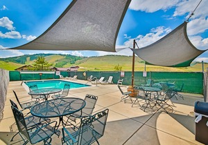 Ski-in/ski-out condo with loft, pool, basketball court & mountain-view balcony