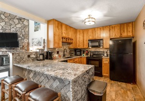 Ski-in/ski-out home with pool, hot tub, sauna, washer/dryer, & private balcony