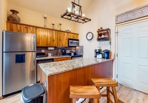 Ski-in/ski-out retreat with wraparound decks, hot tubs, ski views