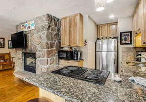 Spacious Condo with 2 Balconies, Free WiFi, Shared W/D, Hot Tub, & Fireplace