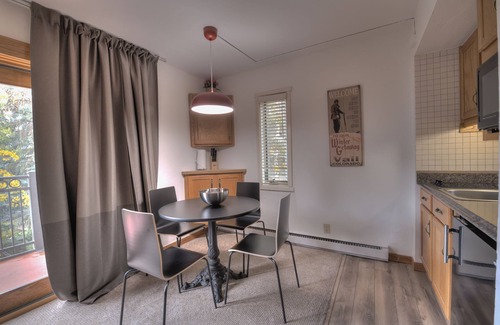Vail Apartment | 1 min. to slopes!Wake up & Ski! Steps to ski lift/gondola, shops & dining!