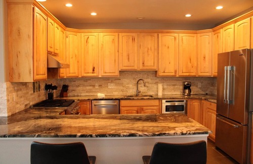 Stanley Hills Condo | A beautiful mountain getaway with hot tub, large deck, and mountain/lake views!
