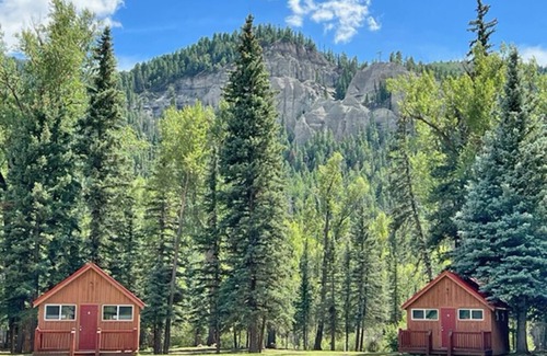 Alamosa Cabin | AIYM Camp Riverfront Cabin #1. In the Rio Grande National Forest, Alamosa Canyon