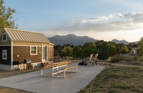 Buena Vista House | Belford is a 1-4 person Tiny Home with bathroom, fridge, induction cooktop, microwave, AC/heat, and beautiful mountain views!