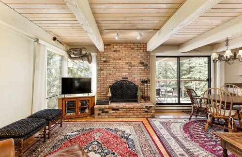 Aspen House | Chateau Eau Claire Unit 18, Spacious Condo Overlooking the River with a Private Deck