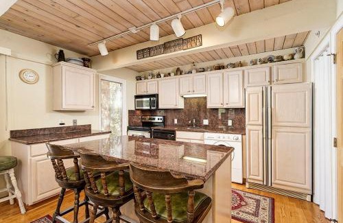 Aspen House | Chateau Eau Claire Unit 18, Spacious Condo Overlooking the River with a Private Deck