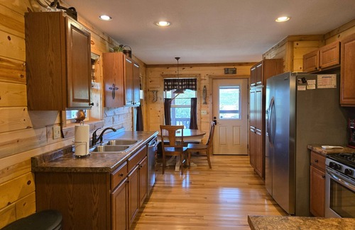 Alpine Village Cabin | Conveniently located cabin with full kitchen, w/d, large deck & great views