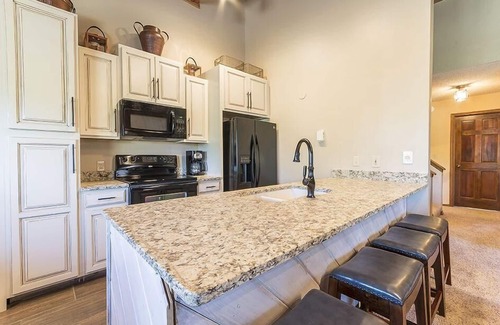 Steamboat Springs House | Expansive Condo! Walk to the Slopes! Winter Shuttle! Heated Pool & Hot Tub!