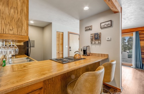 Wildernest Condo | First-floor condo with porch & electric fireplace - close to ski resorts