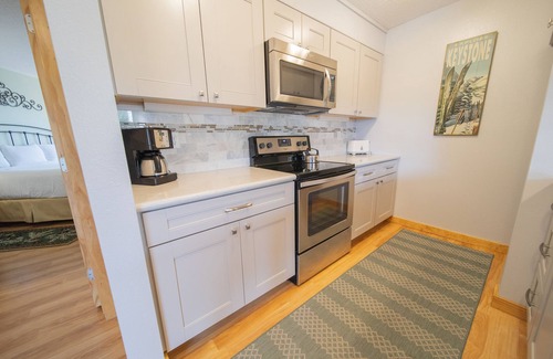 Lakeside Village Condo | Lake Views, Updated, King Bed, Pool & Hot Tub!