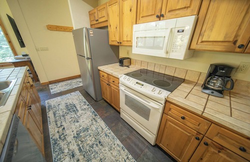 Lakeside Village House | Large Condo with private parking & onsite hot tub
