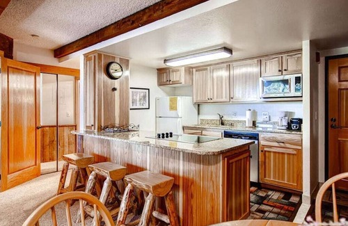 Peak 9 Condo | Lodge-Style Ski-In-Out Condo Perfect for Couples + Heated Pool & Hot Tubs