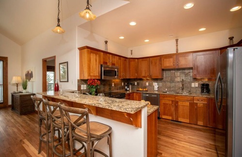 Stanley Hills Condo | Luxurious condo with wood floors, private hot tub, and gorgeous views!
