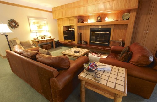 Mountain House Condo | New Private Hot Tub! Walk to Lifts, Log-Burning Fireplace, Warm and Cozy