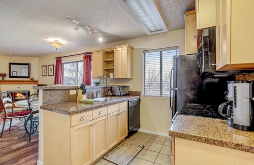 Englewood Condo | Partial view of Rocky Mountains from balcony!