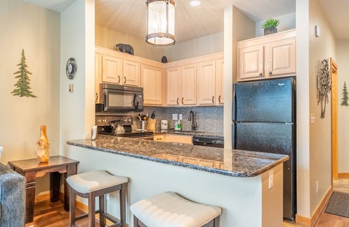 Lakeside Village Condo | Private Patio w/Lake and Mountain Views, Shared Pool, Sauna & Hot Tub!